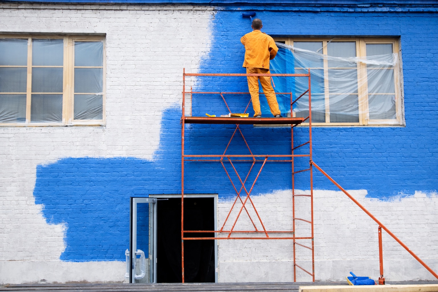 Professional painters-working on apartment exterior